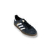 Classic Adidas Samba soccer shoe featuring black suede upper and white stripes