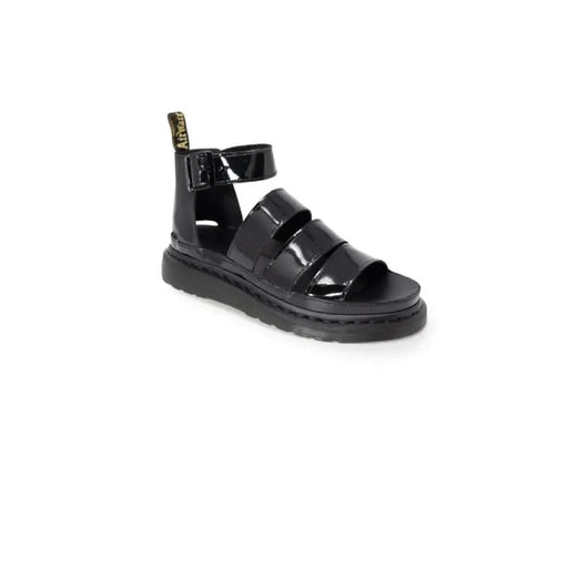 Close-up of Dr. Martens women sandals with side buckle on black sandal