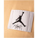 Urban style Jordan men T-shirt with close-up of white and black Jordan logo on white cloth