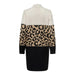 Colorblock sweater dress with leopard print and solid cream, tan, and black sections