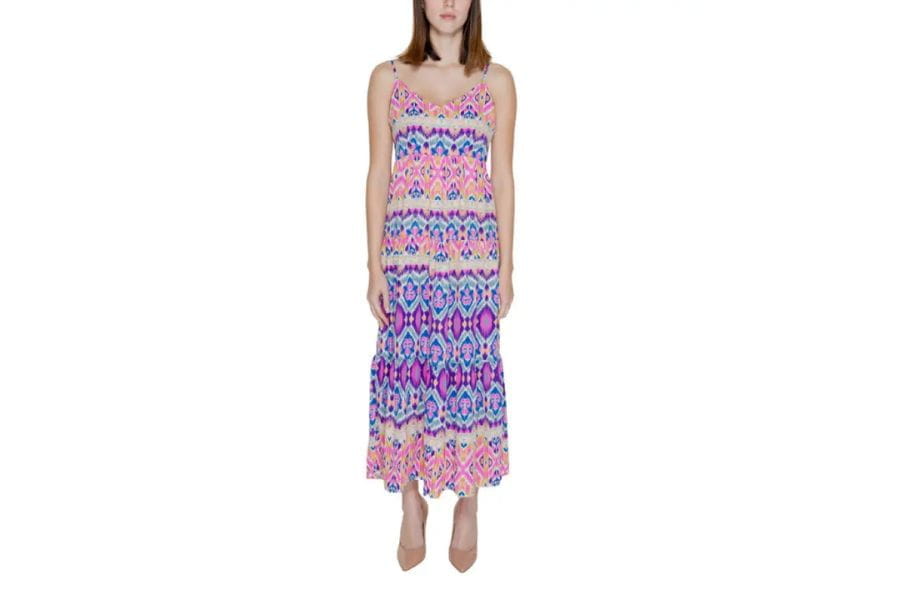 Colorful patterned maxi dress with spaghetti straps for a stylish holiday outfit.