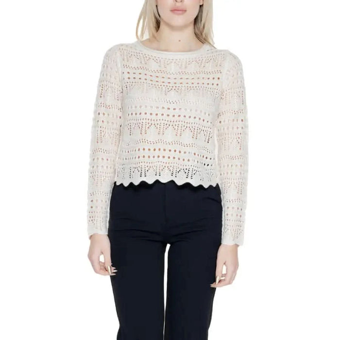 Cream-colored crocheted sweater with openwork pattern and scalloped hem from Jacqueline De Yong