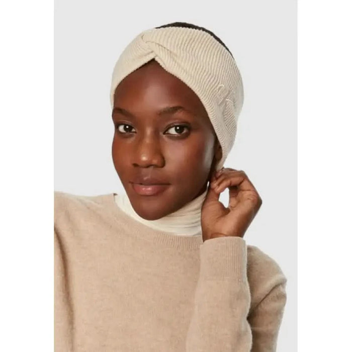 Cream-colored knit turban-style headband featured in Calvin Klein Jeans Women Cap