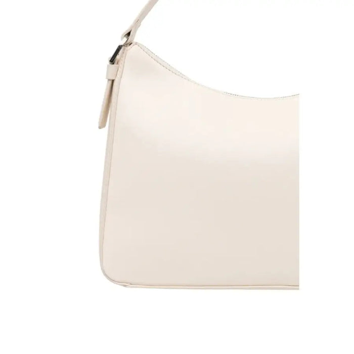 Cream-colored leather handbag with curved silhouette by Calvin Klein for women