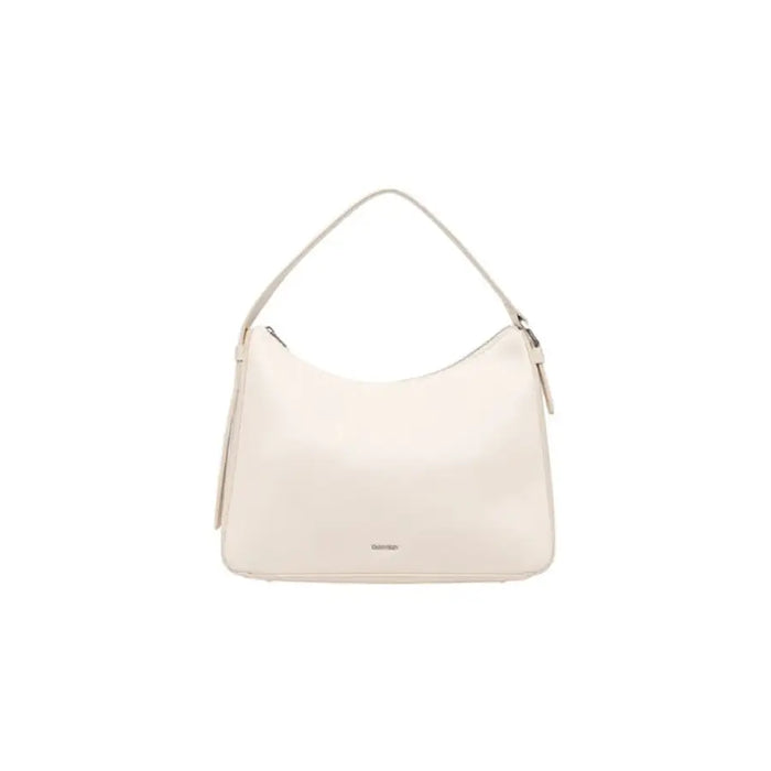 Cream-colored leather hobo handbag with curved shoulder strap by Calvin Klein