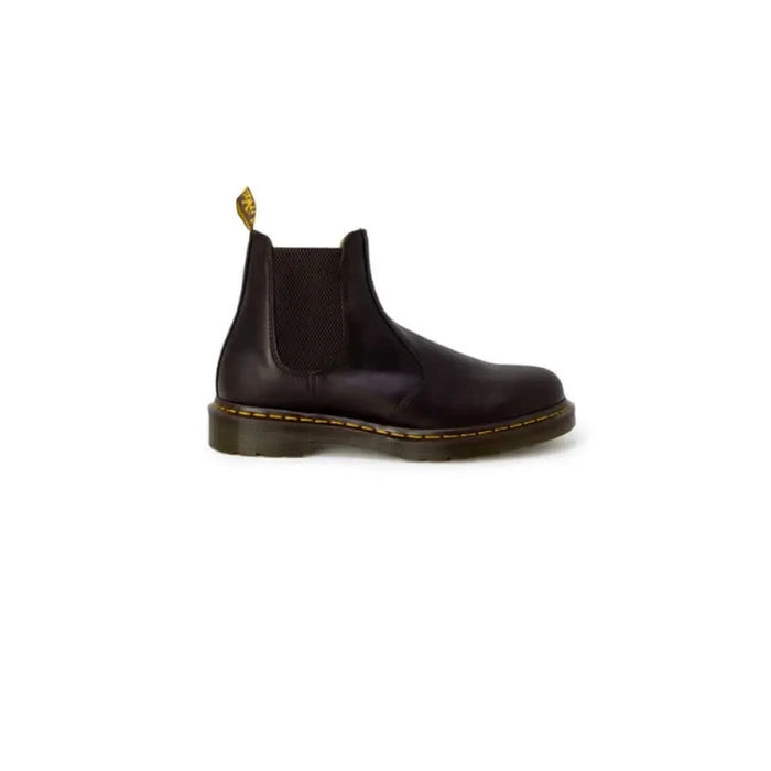 Dark brown leather Chelsea boot with yellow stitching and chunky sole by Dr. Martens