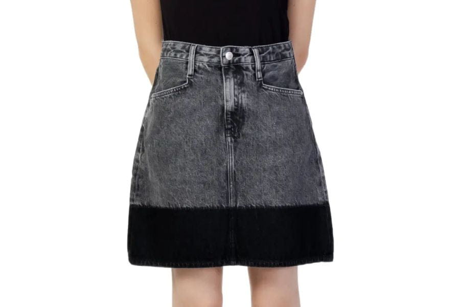 Denim skirt with two-tone design, perfect for summer outfit ideas to shop this season.