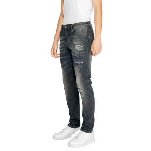 Distressed dark gray Icon Men Jeans featuring rips and fading for a stylish look