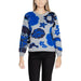 Floral patterned sweater in blue and gray styled with black pants from Desigual Women Knitwear