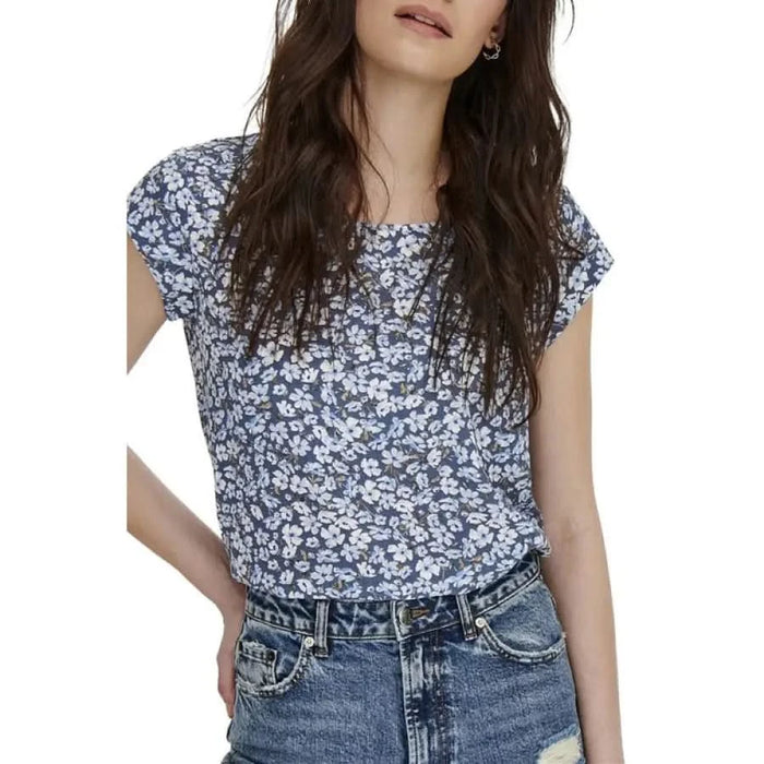 Floral print cap-sleeve top with blue denim jeans from Only Women Blouse