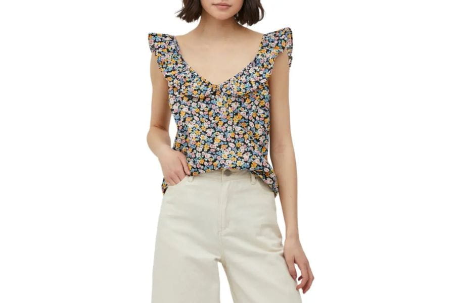 Floral print sleeveless top with ruffled shoulders for a stylish summer outfit idea to shop.