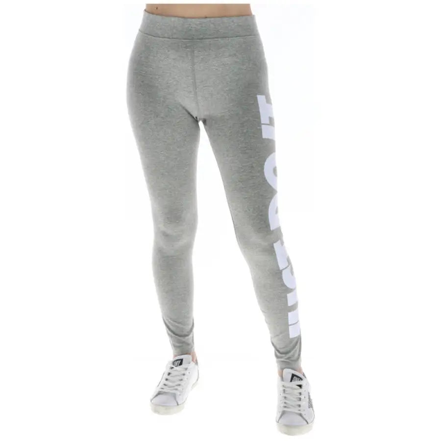 Gray Nike women’s leggings with ’JUST DO IT’ on one leg