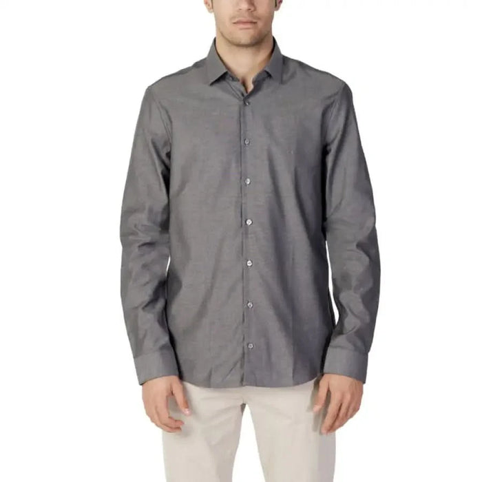 Gray button-up dress shirt with collar and long sleeves by Calvin Klein