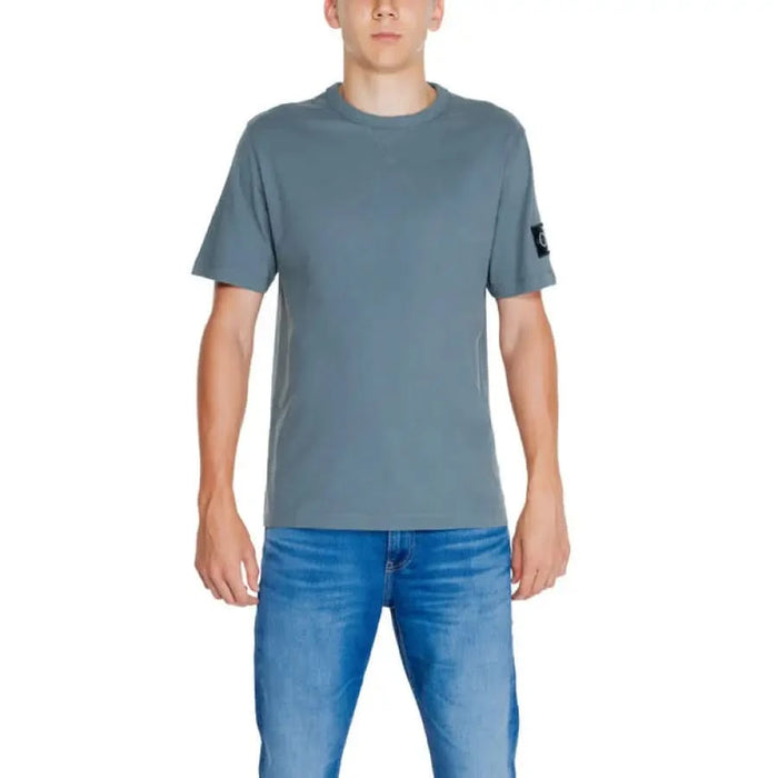 Gray crew neck t-shirt with blue jeans from Calvin Klein Jeans Men collection