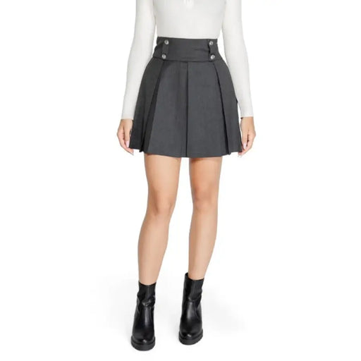 Gray pleated mini skirt with decorative buttons at waistband by Morgan De Toi