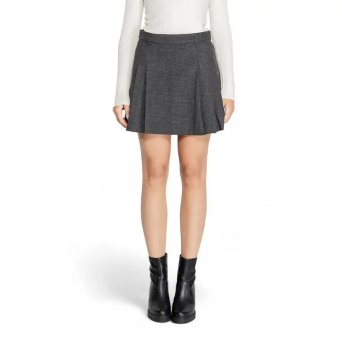 Gray pleated mini skirt paired with black ankle boots from Only Women Skirt collection