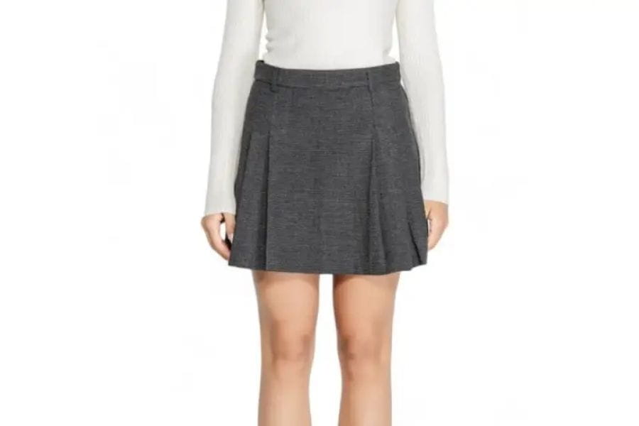 Gray pleated mini skirt featuring a stylish high waistline for first date outfits.