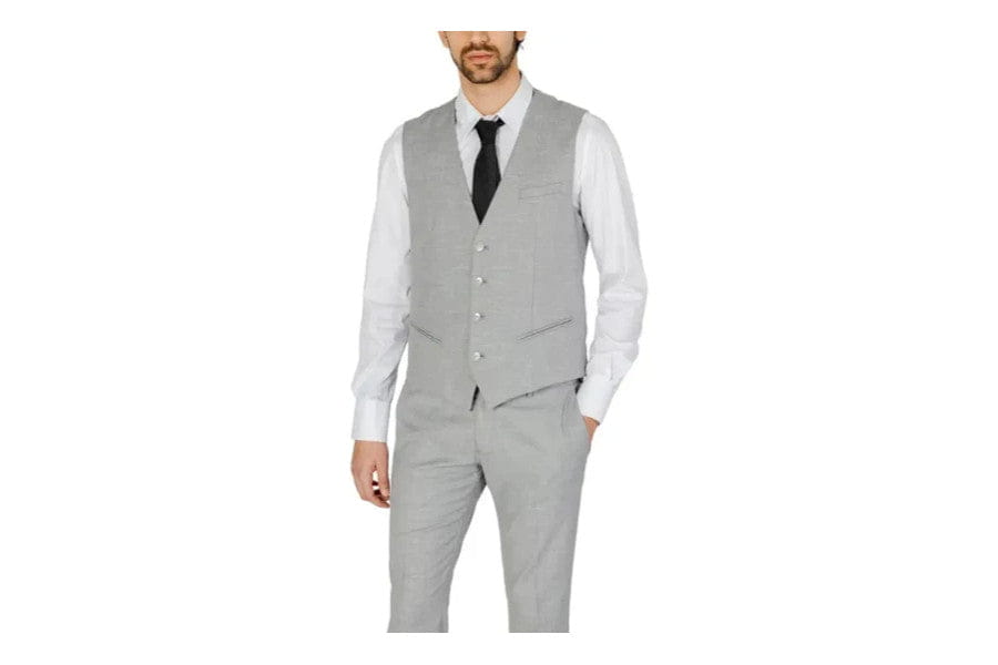 Gray suit vest over white dress shirt and black tie exemplifying old money style elegance.