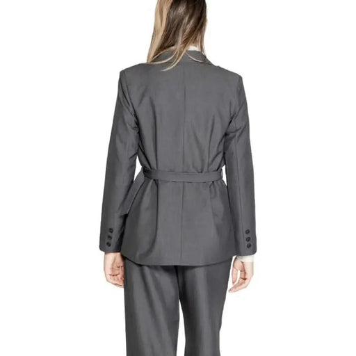 Gray women’s blazer jacket with belted waist and button details on sleeves by Only