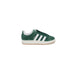 Green Adidas sneaker with white stripes and gum sole featured in Adidas Men Sneakers