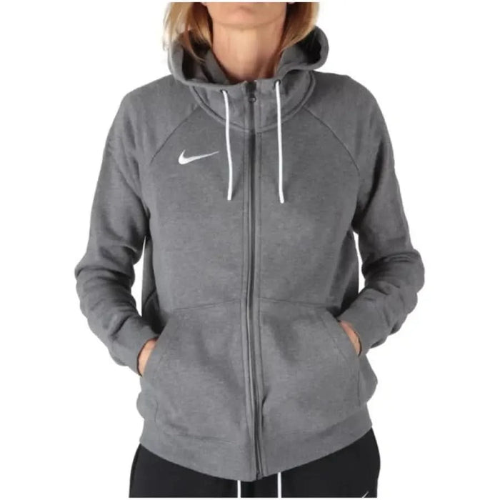 Grey Nike zip-up hoodie for women featuring drawstrings and front pockets