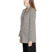 Houndstooth patterned blazer on woman with long brown hair from Only Women collection