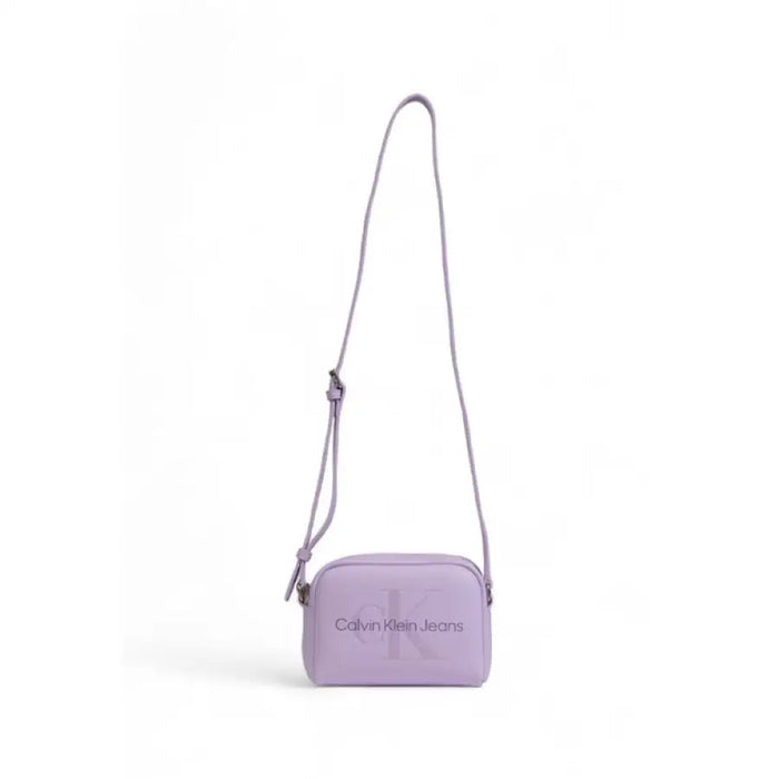 Lavender Calvin Klein crossbody bag with long strap showcased in Women Bag collection