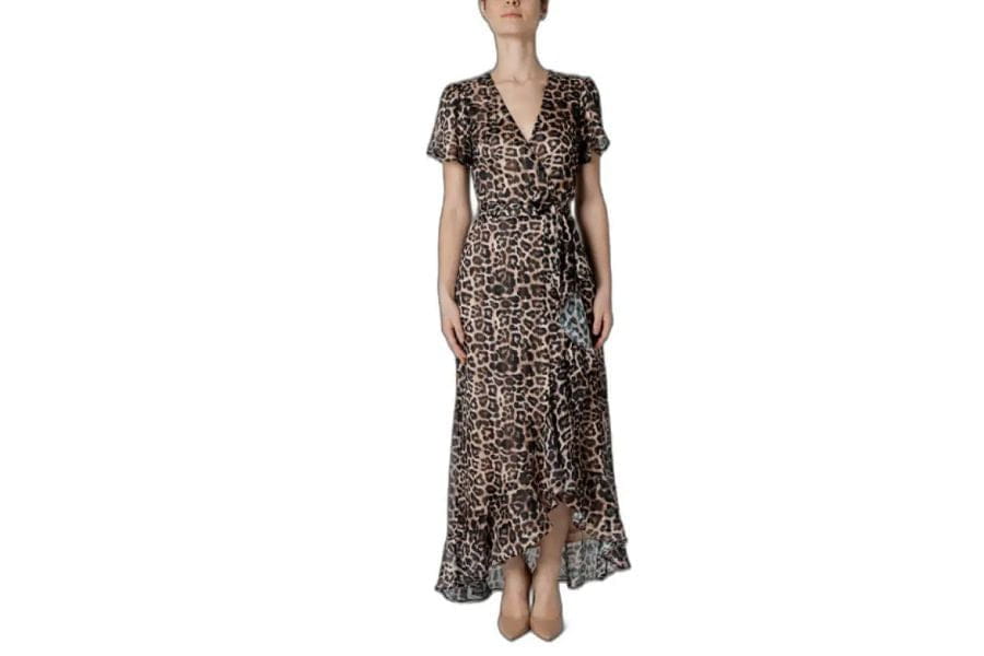 Leopard print wrap dress with high-low hemline for stylish holiday outfits.