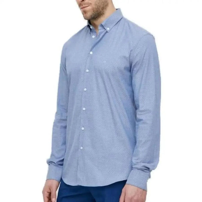 Light blue Calvin Klein button-down dress shirt with long sleeves for men