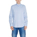 Calvin Klein Men Shirt - Light blue button-up dress shirt with blue jeans for a casual look