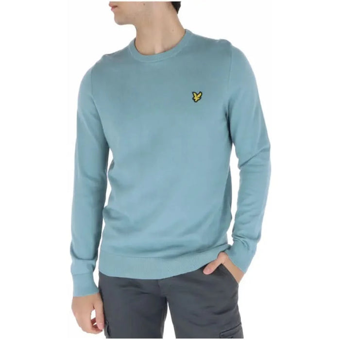 Light blue crew neck sweater featuring yellow Lyle & Scott eagle logo for men