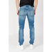 Light blue Calvin Klein denim jeans with faded appearance and visible back pockets