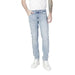 Light blue denim jeans worn by a person from Calvin Klein Jeans for men