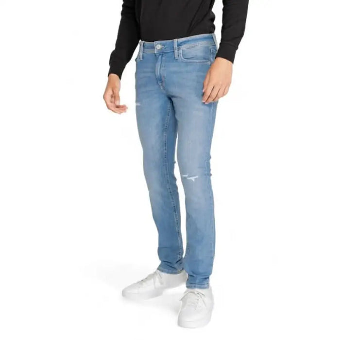 Light blue distressed skinny jeans with knee rip from Jack & Jones Men Jeans collection