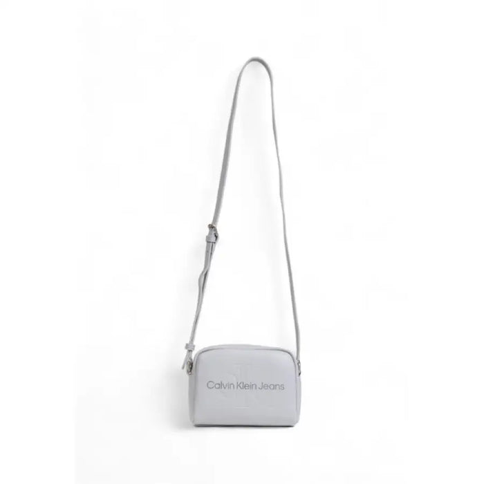 Light gray crossbody bag featuring Calvin Klein Jeans branding for women