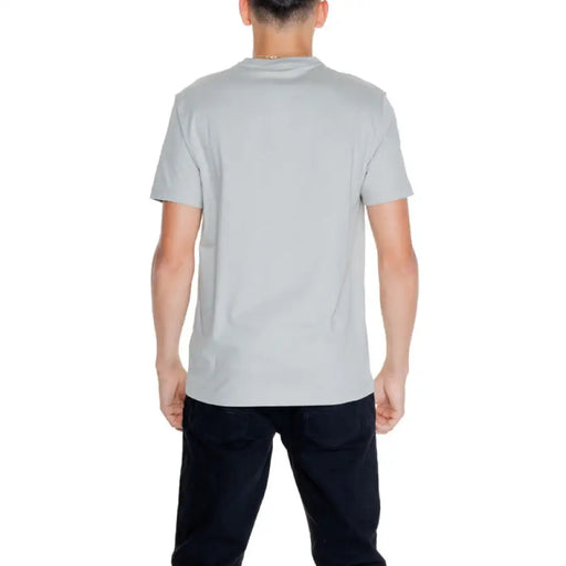 Light gray short-sleeved Calvin Klein men t-shirt modeled from the back