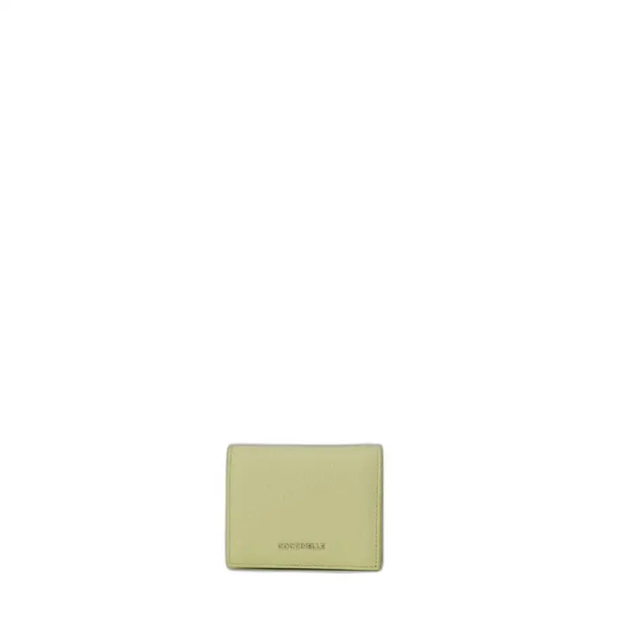 Light green leather wallet or card holder with ’COCCINELLE’ branding