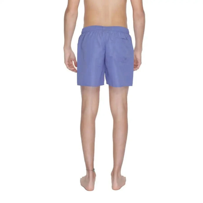 Light purple swim shorts worn by a person viewed from behind, Ea7 - Ea7 Men Swimwear