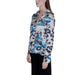 Long-sleeved Guess Women Blouse featuring an abstract blue, black, and white pattern