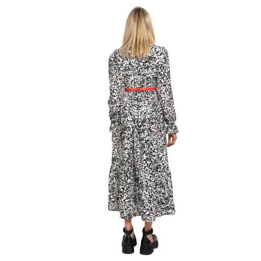 Blonde woman in long-sleeved floral maxi dress with red belt, Only Women Dress