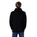 Man in black hoodie from Icon Men Sweatshirts showcasing urban city style fashion