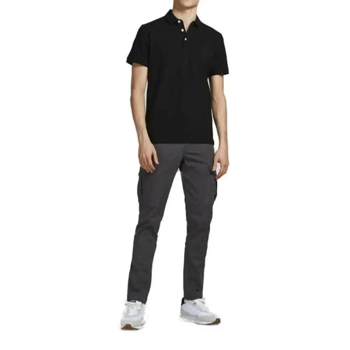 Stylish man in black polo shirt and grey pants - Jack & Jones Men Polo