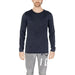 Man in black sweater and grey pants from Jack & Jones Men Knitwear