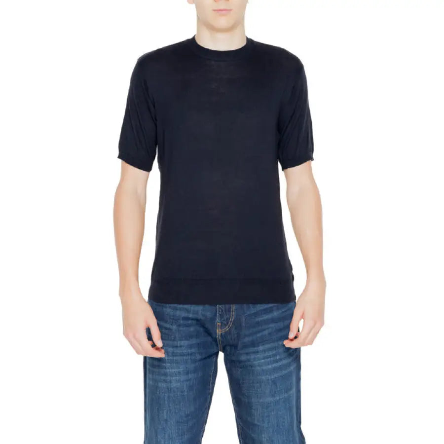 Man in a black T-shirt and jeans from Hamaki-ho Men Knitwear collection