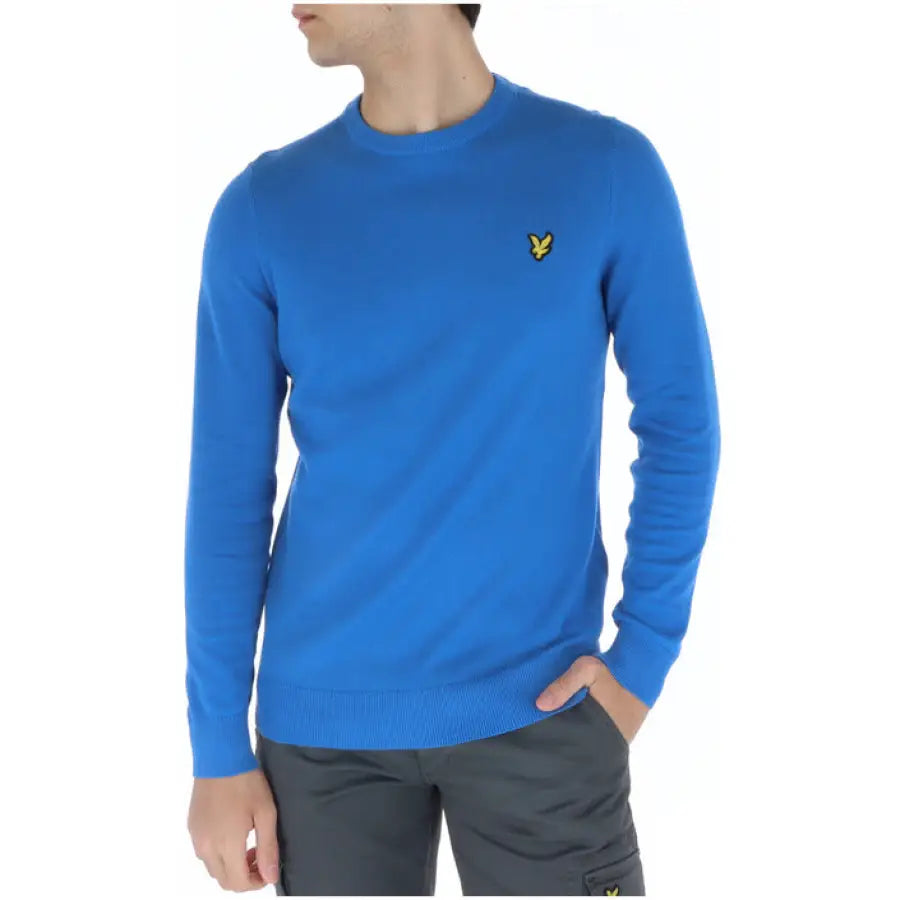 Man wearing blue Lyle & Scott sweater from Lyle & Scott Men Knitwear collection