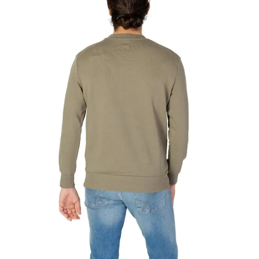 Man in a green sweater and jeans from Gas - Gas Men Sweatshirts collection