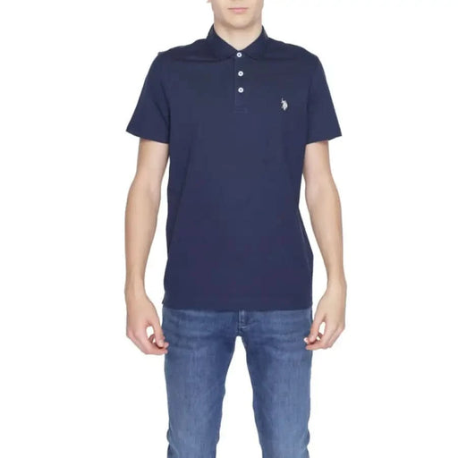 Man in navy U.s. Polo Assn. polo shirt with white chest logo - U.s. Polo Assn. Men Polo