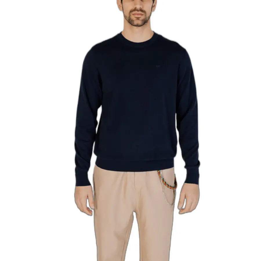 Man in navy sweater and tan pants from Gas - Gas Men Knitwear collection