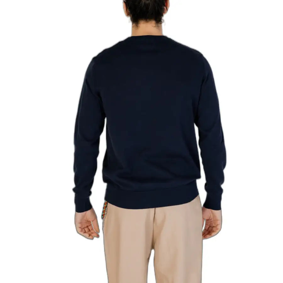 Man in navy sweater and khaki pants from Gas - Gas Men Knitwear collection