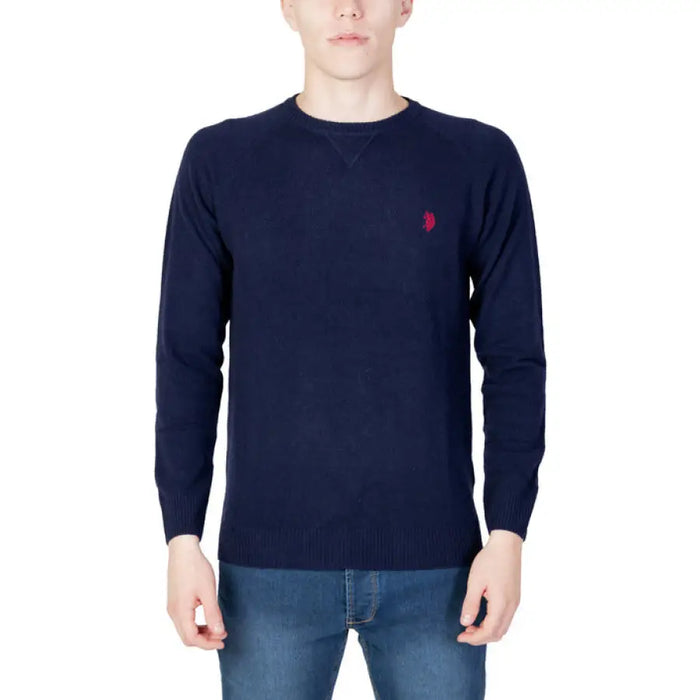 Man wearing a navy sweater by U.s. Polo Assn. from the U.s. Polo Assn. Men Knitwear collection